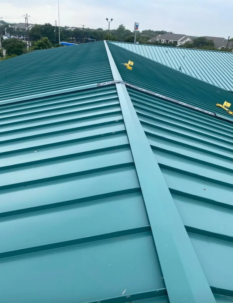 Green commercial metal roof ridge and valley for Metal Roof Repair in Oroville East